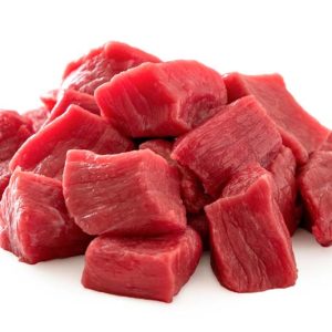 Beef Cube Cuts, stacked together on white background