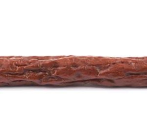 One piece of Grass Fed Devon Beef Stick on White Background