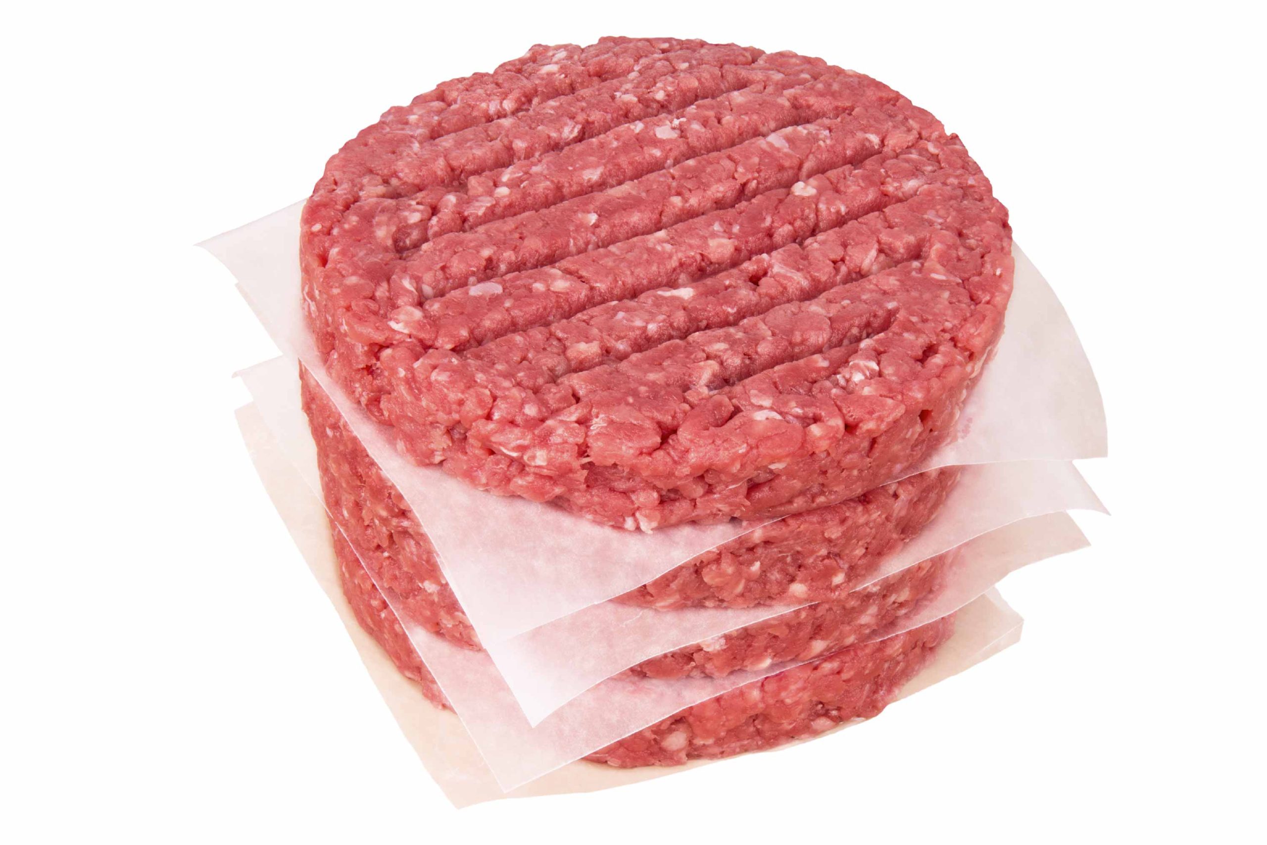 Four stacks of 4/4oz Thin Beef Patties on top each other on a white background
