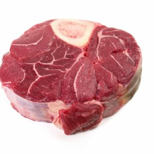 A beautiful cut of our osso bucco beef on white background