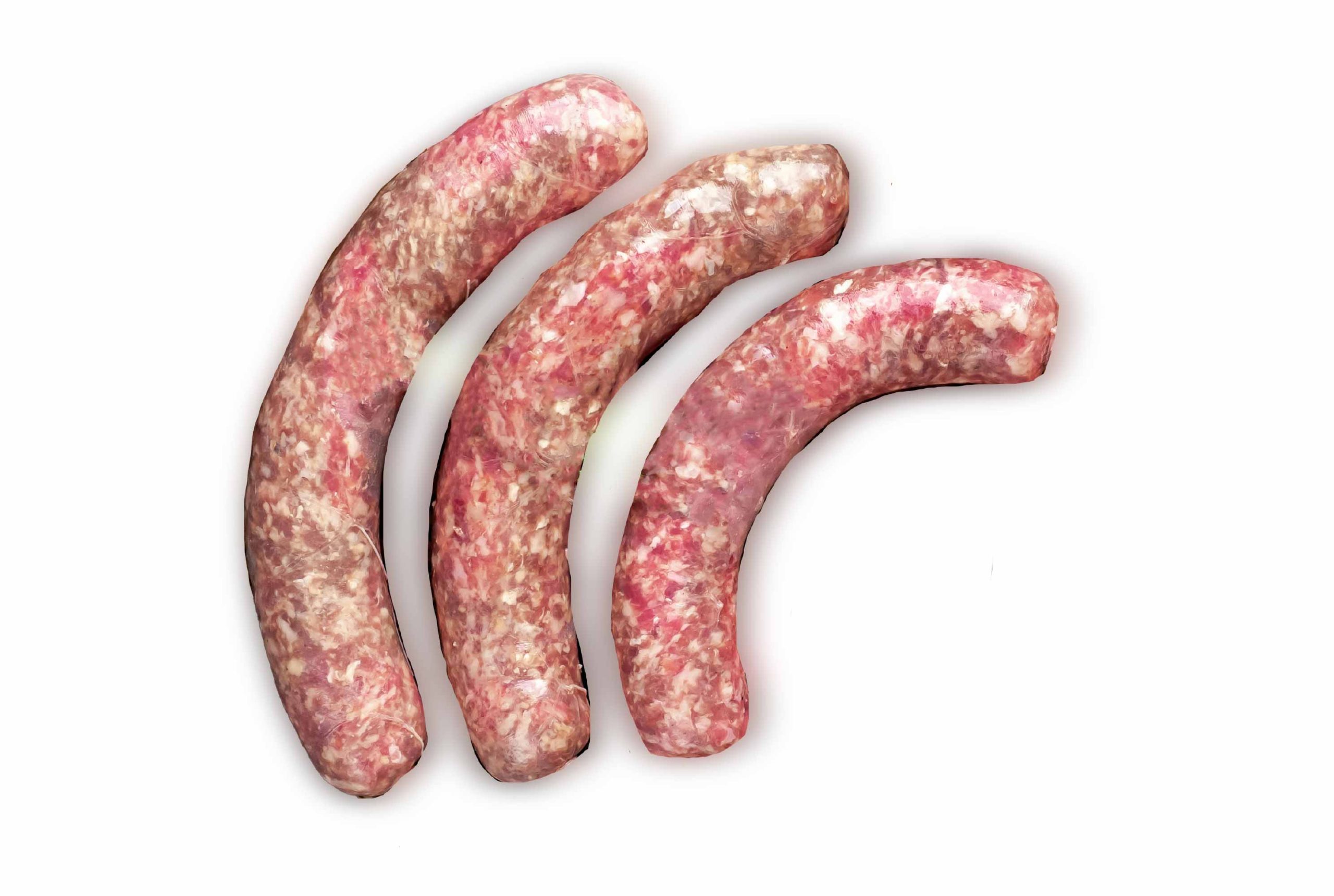Three Raw Beef Kielbasa Grillers beside each other on White Background