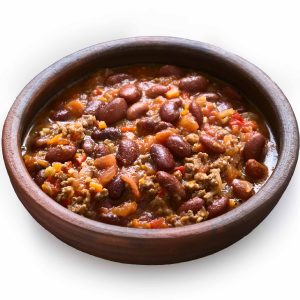 Cooked Beef Chili with Beans on a wooden bowl on white background